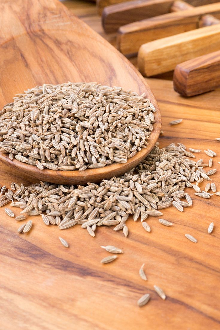 Cumin in the wooden spoon